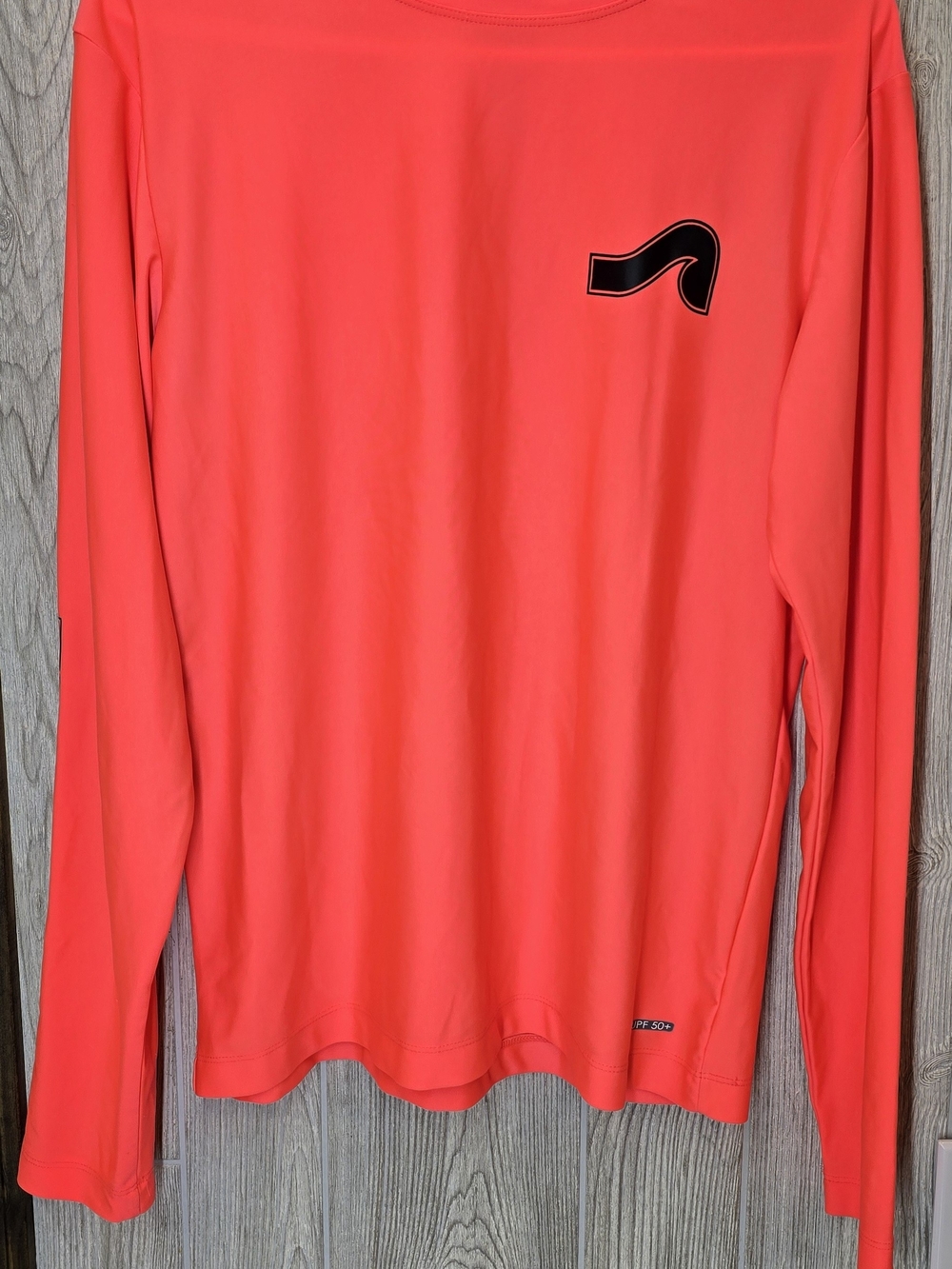 surf style Coral Performance Top with Black Logo
